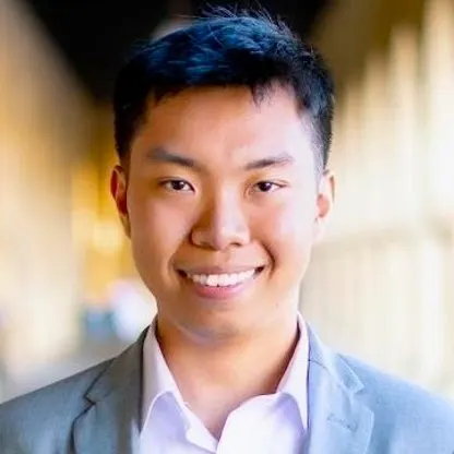 A headshot of Phillip Tran in Stanford's Main Quad.