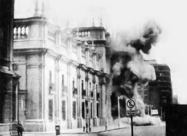 An image of the bombing of La Moneda (the presidential palace) in Chile during the 1973 coup. (Photo Credit: Wikimedia Commons)