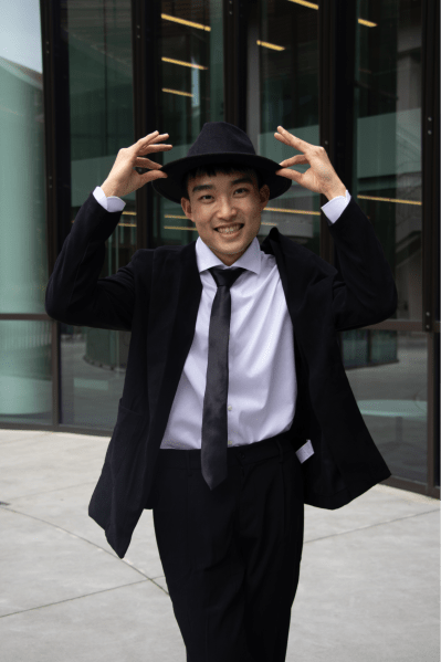 Eddie Chen ’28 poses in costume.