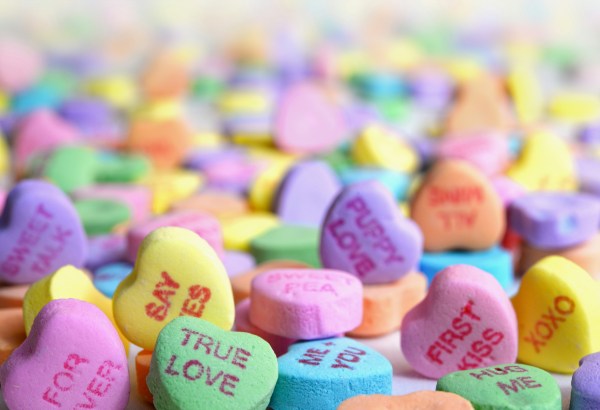 A close-up of a stack of conversation hearts.