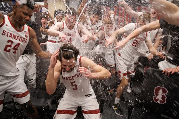 Stanford players celebrate in locker room