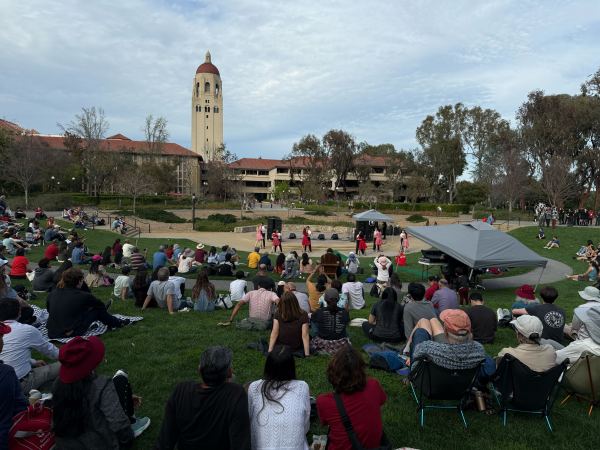 Families watch performances on Meyer Green.