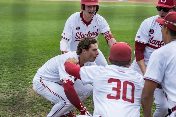 Stanford baseball players celebrate in circle