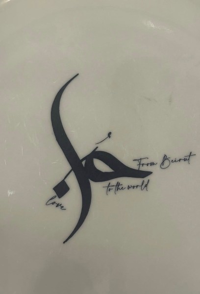 Arabic calligraphy with the message "Love from Beirut to the world"