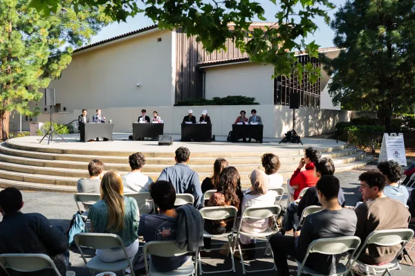 The three slates running for ASSU executive president and vice president argued for their platforms at a debate in White Plaza. (Photo: CAYDEN GU/The Stanford Daily).