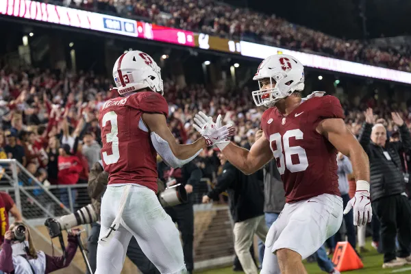 Two Stanford players celebrate after a play against Cal last season.