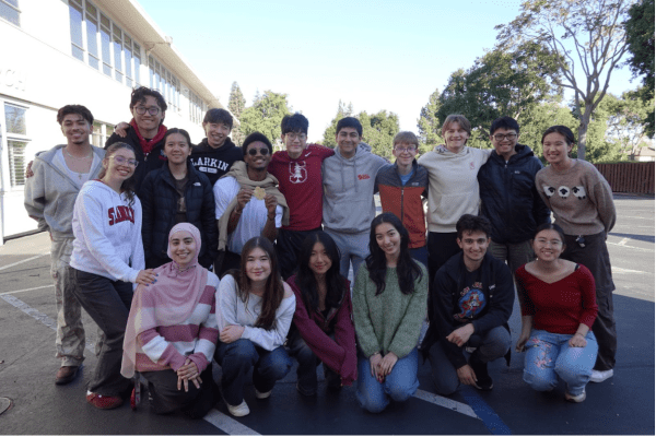 Members of the Stanford Breakfast Club pose for a photo after working a shift
