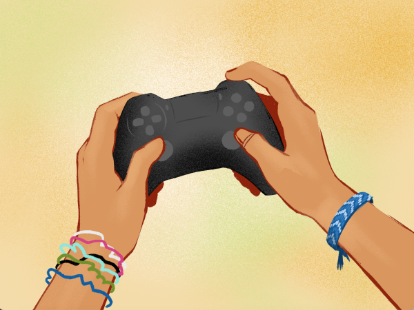A pair of hands holding up a video game controller