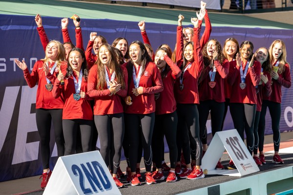 The Stanford artistic swimming team celebrates winning their 11th national championship on Saturday at Avery Aquatic Center. (Photo: LYNDSAY RADNEDGE/ISI Photos)