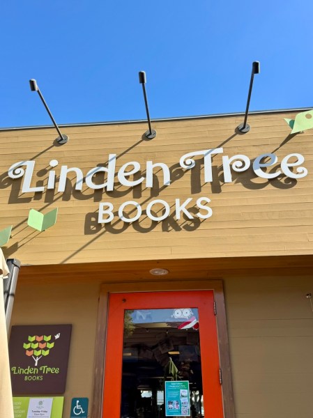 Photo of the red door that leads into Linden Tree Books.