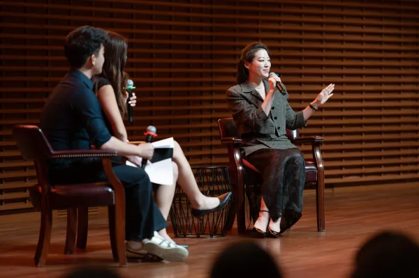 Arden Cho speaks to the audience as part of the Listen to the Silence Conference. (Photo: CAYDEN GU/The Stanford Daily)