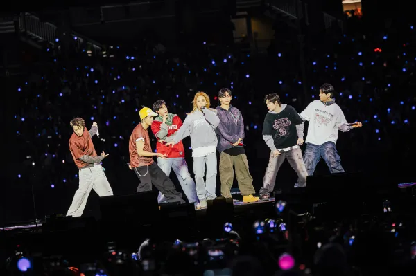 A photo of BTS performers on stage