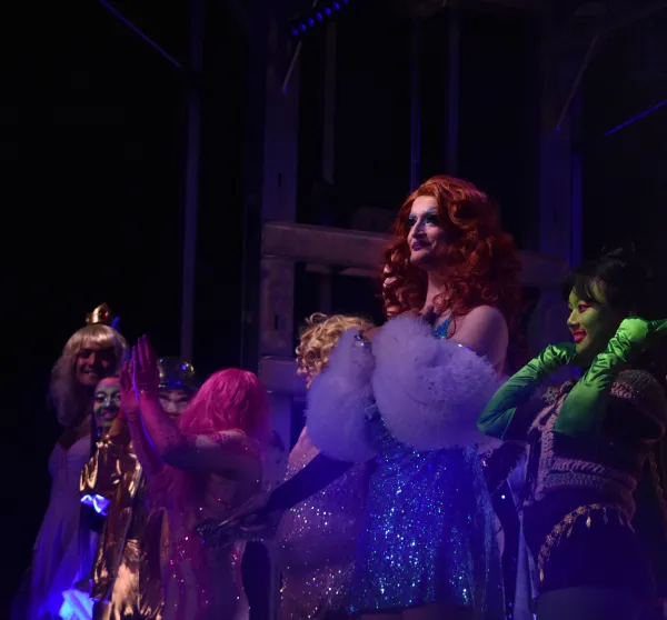 Drag performers on stage