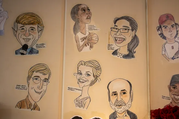 Portraits on the wall of CoHo. Clockwise from left to right: Journalist Ted Koppel M.A. ’62, former WNBA player Candice Wiggins ’08, UGS chair Shelley Gao ’11, men’s tennis player Alex Clayton ’11, golfer Tiger Woods (dropped out in 1996), former chairman of the federal reserve Ben Bernanke (GSB professor), actress Reese Witherspoon (dropped out in 1996), psychology professor James Gross.