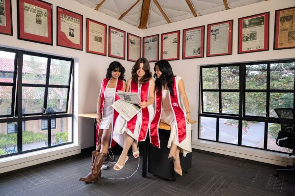 Lauren Koong '26 with Greta Reich '26 and Ananya Udaygiri '26, the executive editing team of The Daily Volumes 267-268. (Photo: CAYDEN GU/The Stanford Daily)