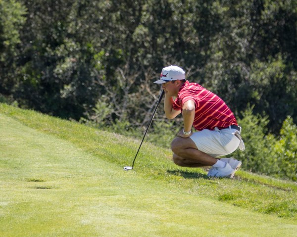 Michael Thorbjornsen preparing to putt during round 3 of the 2024 NCAA Stanford Regional Tournament on May 15, 2024. (PHOTO: Al Chang/ISI Photos)