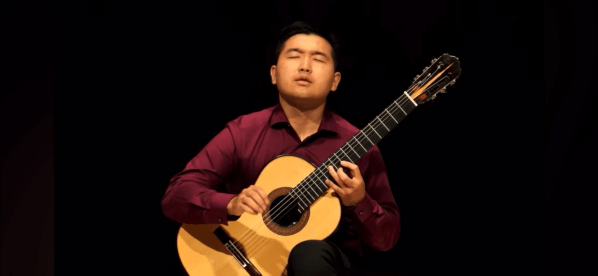 Eric Wang performs in the Guitar Foundation of America’s 2026 International Concert Artist Competition. (Photo: Courtesy of Eric Wang)
