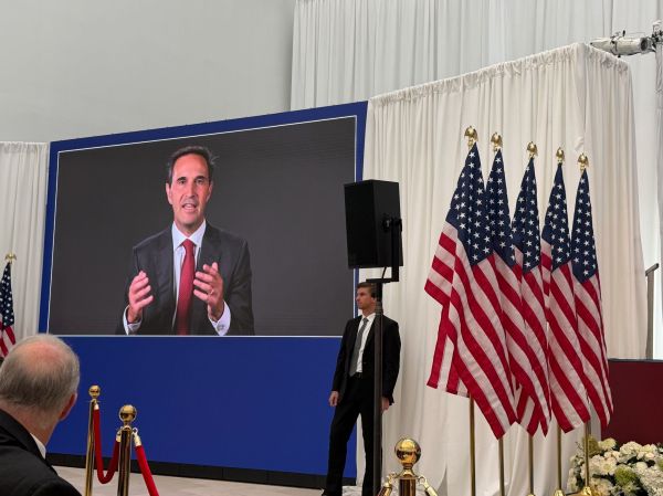 Jon Levin on a large screen.