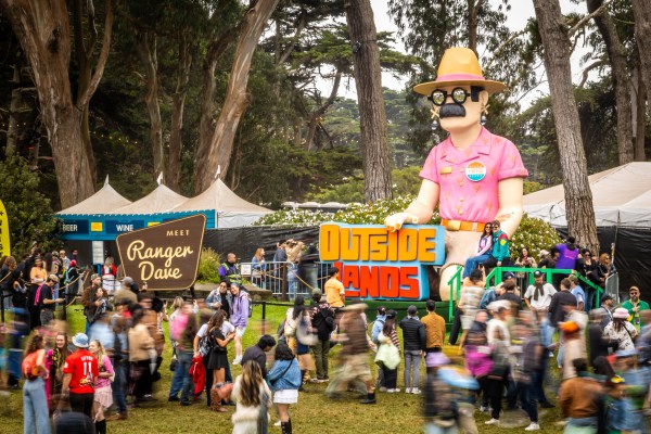 People moving through a music festival.