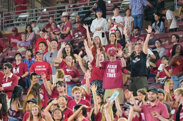 Fans cheer in the stands during Stanford versus Elon football game. Stanford football broke their two-game losing streak, while the Cardinal saw wins across Stanford athletics all week. (PHOTO: Fausto Ibarra/ISI Photos)