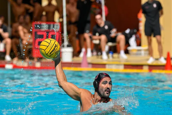 Gavin West looks for passing options during a game against Long Beach State at Avery Aquatic Center on Sept. 19. Men's water polo pulled off a sweep against two highly ranked Los Angeles teams. (Photo: BOB DAHLBERG/ISI Photos)