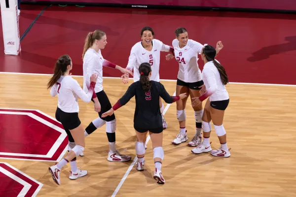 Julia Blyashov, Lizzy Andrew, Spencer Etzler, Jordyn Harvey, Logan Parks and Malyssa Cawa celebrate during Virginia Tech game. Blyashov put up an impressive .607 hitting percentage, 18 kills and 19.5 points against Virginia that same weekend. (Photo: MIKE RASAY/ISI Photos)