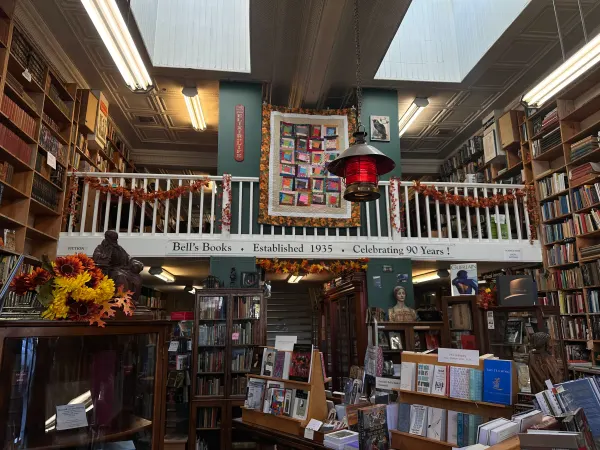 The interior of Bell's Books in Palo Alto, with a staircase and bookshelves